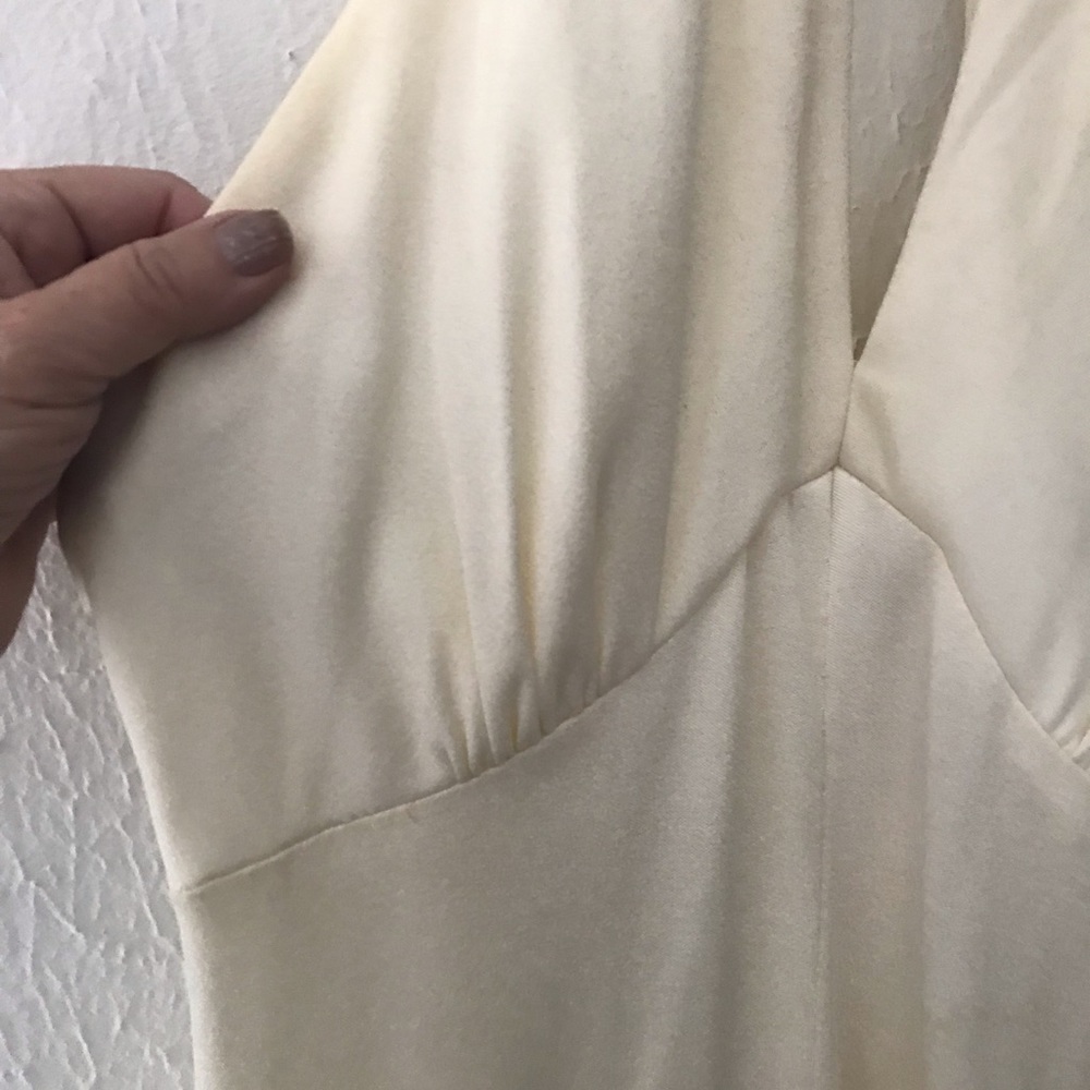 Juniors size 13 pure white halter dress. Beautiful flow. Vintage